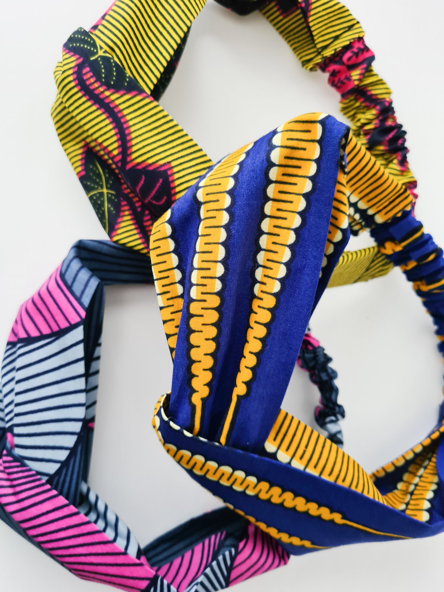 Assortment of multicoloured headbands available at Lolly and Kiks