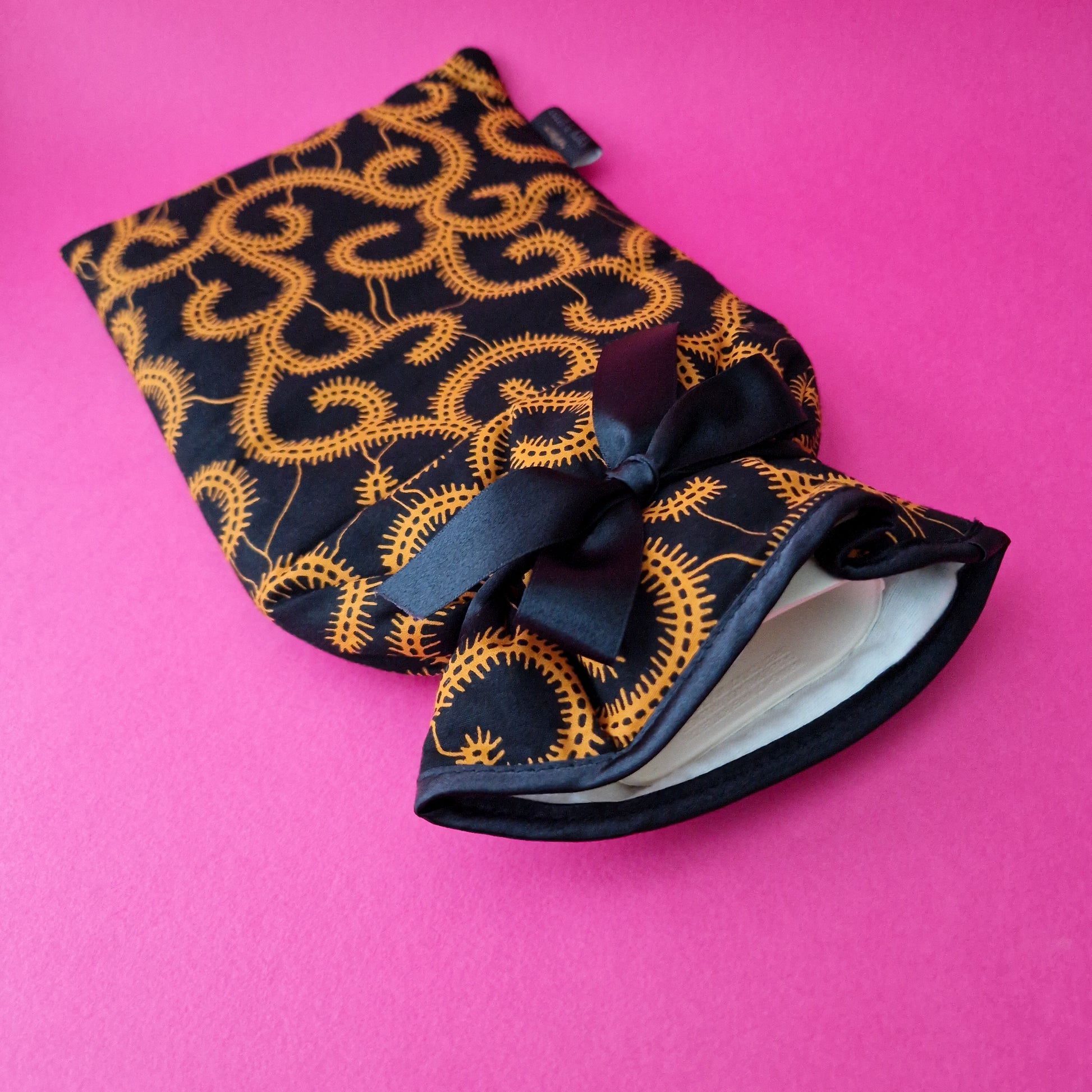 Black african print hot water bottle cover
