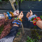 kente african print hairbands on arms wrists