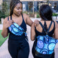 Models wearing Lolly and Kiks bumbag and backpack in blue Adedapo print 