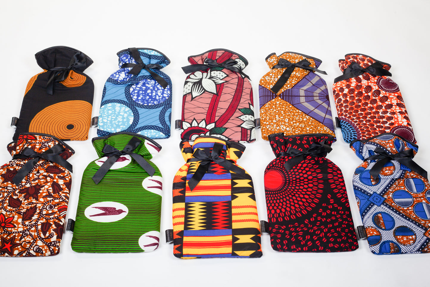 different colourful african holland wax hot water bottles uk