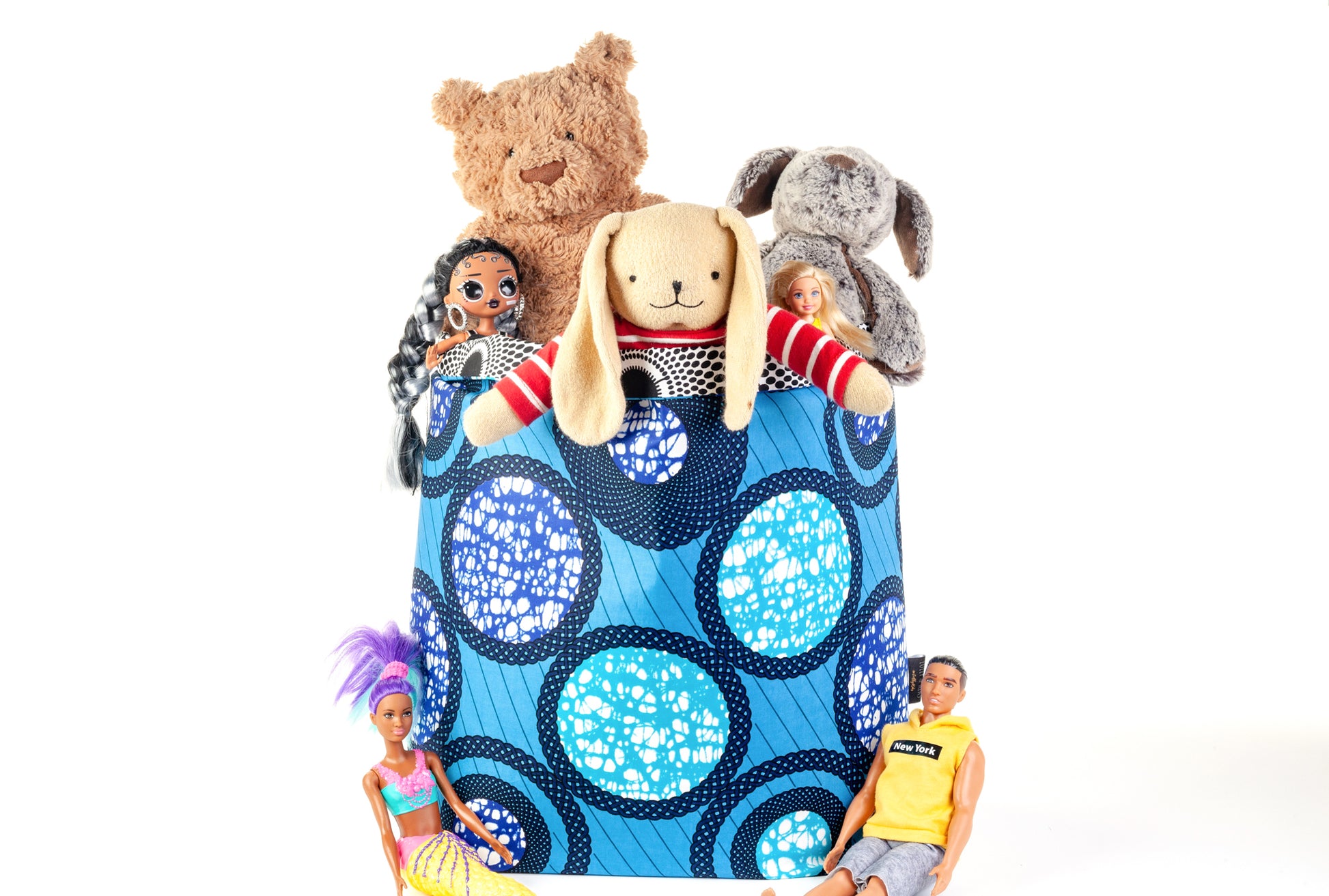 adedapo print xl Lolly & Kiks basket, filled with childrens soft toys and dolls